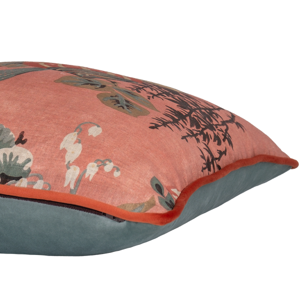 Side shot of a decorative linen cushion with a large boquet of flowers in salmon, red, duck egg blue and rich brown.