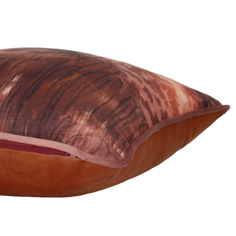 Cushion featuring an impressionist style painting of a forest scene