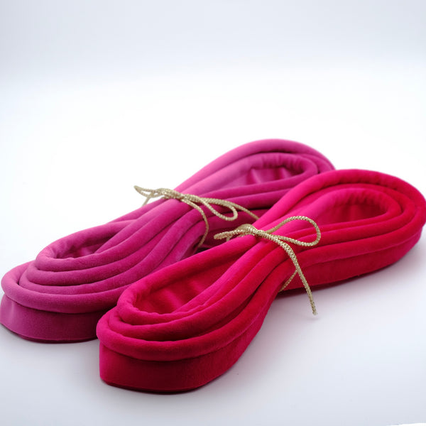 Photo of two bundles of hot pink velvet piping cords