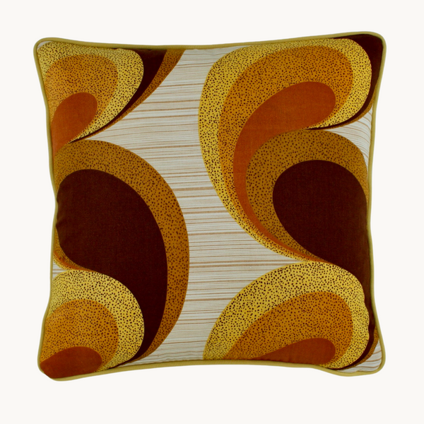 Photo of a cushion with a 1970s groovy graphic