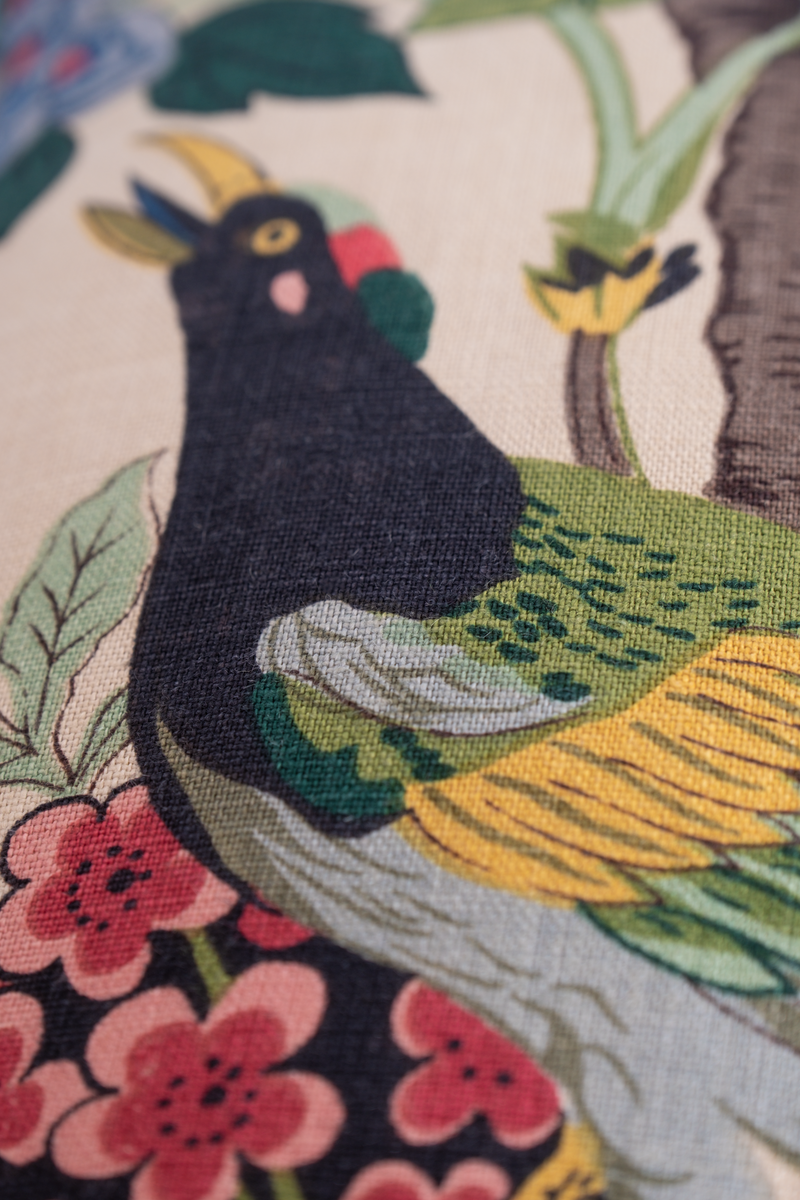 Close up of a linen print featuring a bird