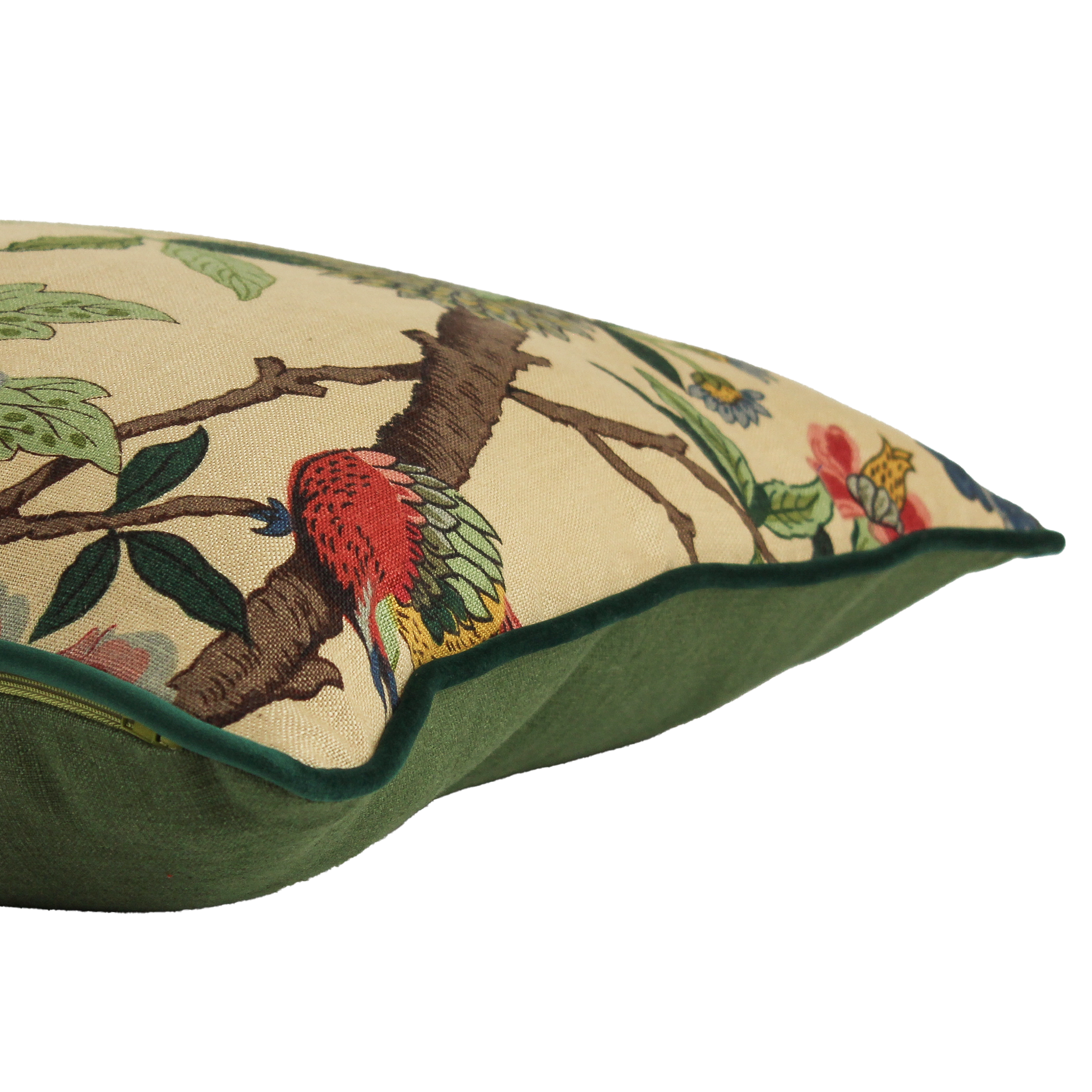 Decorative pillow with bird and branch pattern on a beige background
