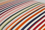Close up of a muticoloured satin weave striped fabric