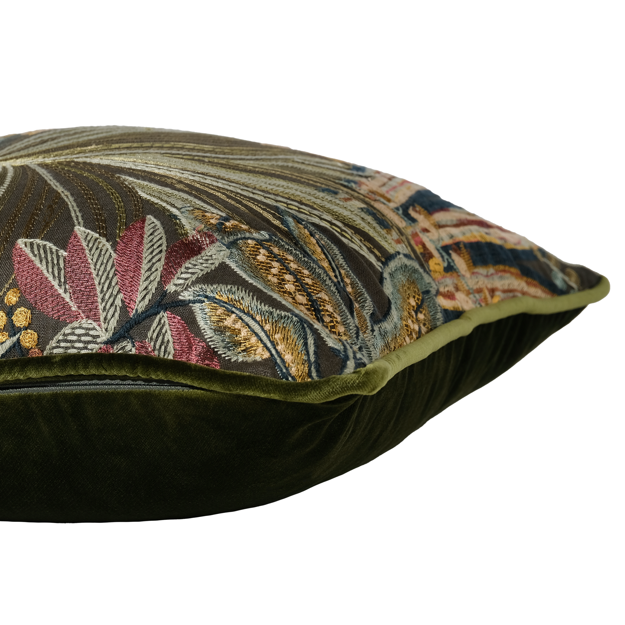Side shot of a cushion featuring an embroidered jungle design on an olive linen basecloth