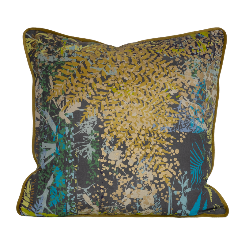Decorative cushion with botanical silhouettes in multiple colours on a grey background