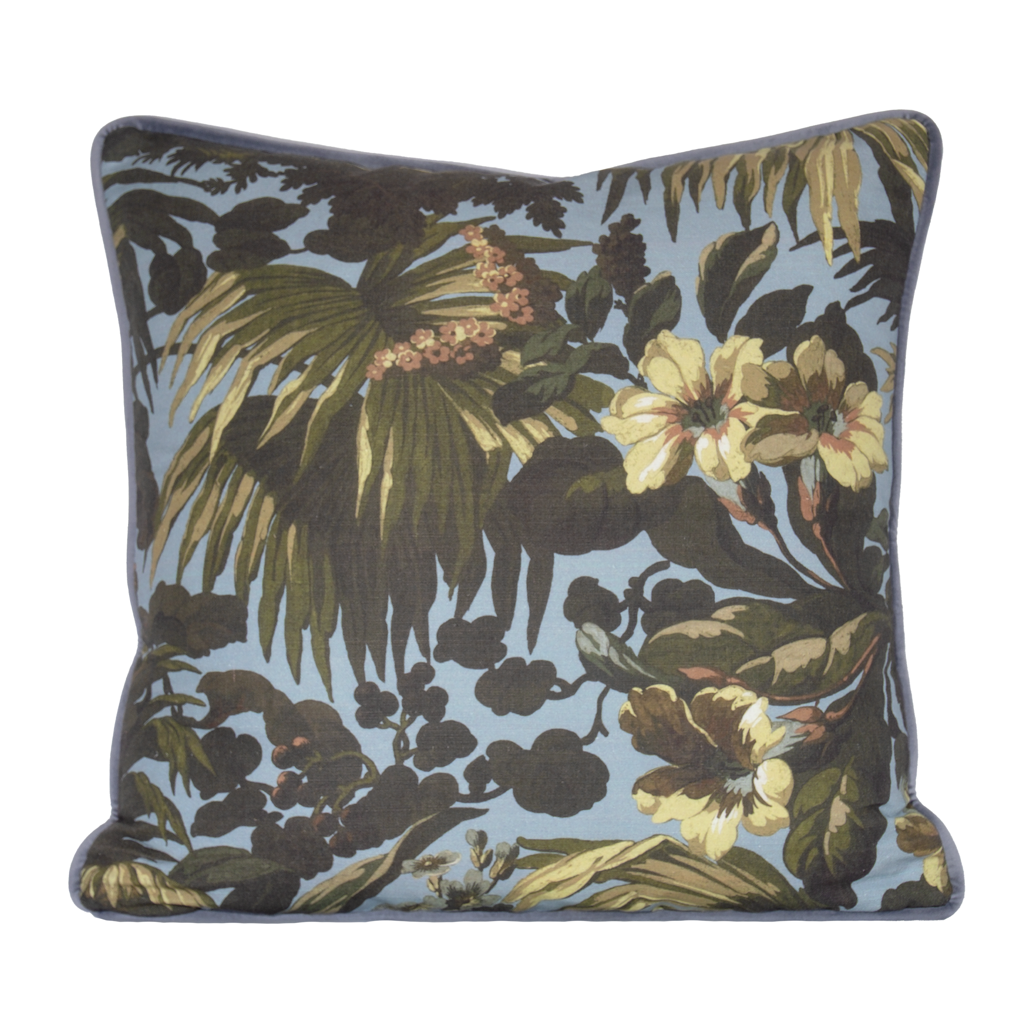Floral and leaf patterned cushion on a light blue background