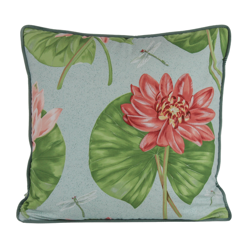 Decorative cushion with pink lotus flowers and green leaves on a light blue background