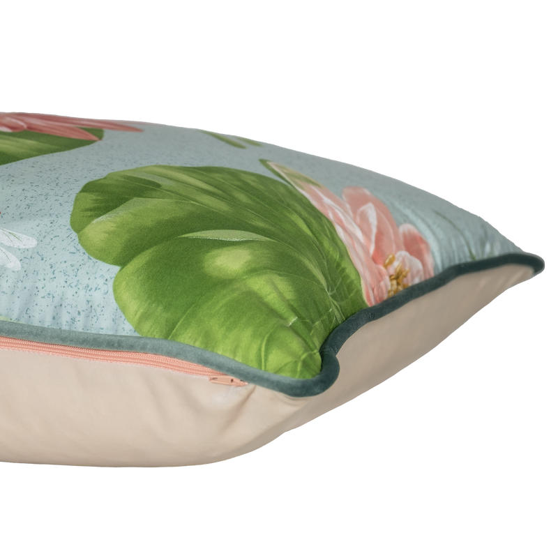 Decorative cushion with floral and leaf pattern on a white background