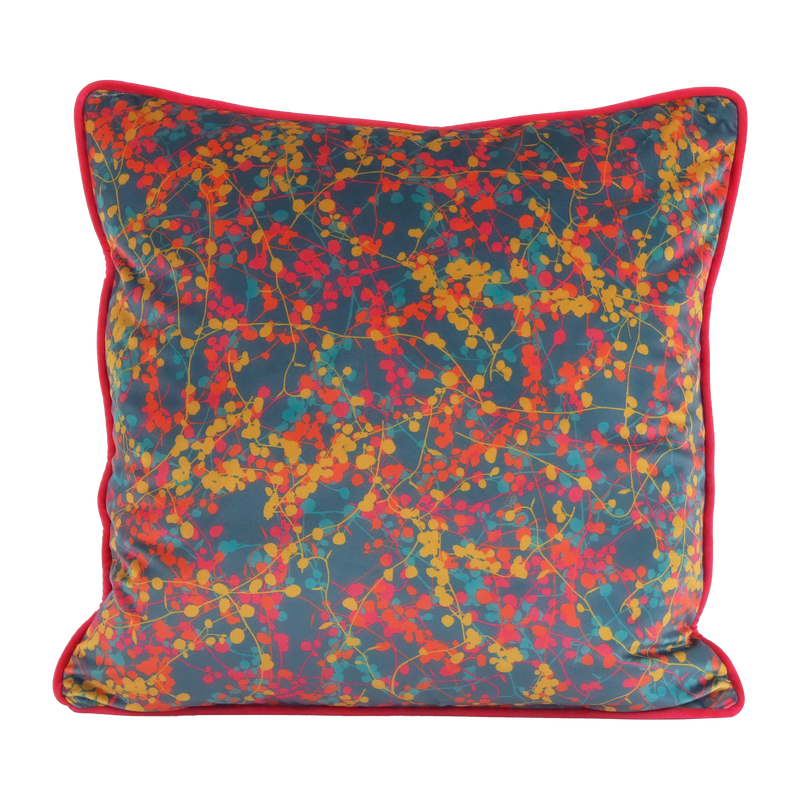Colourful velvet cushion with fine vine leaves all over