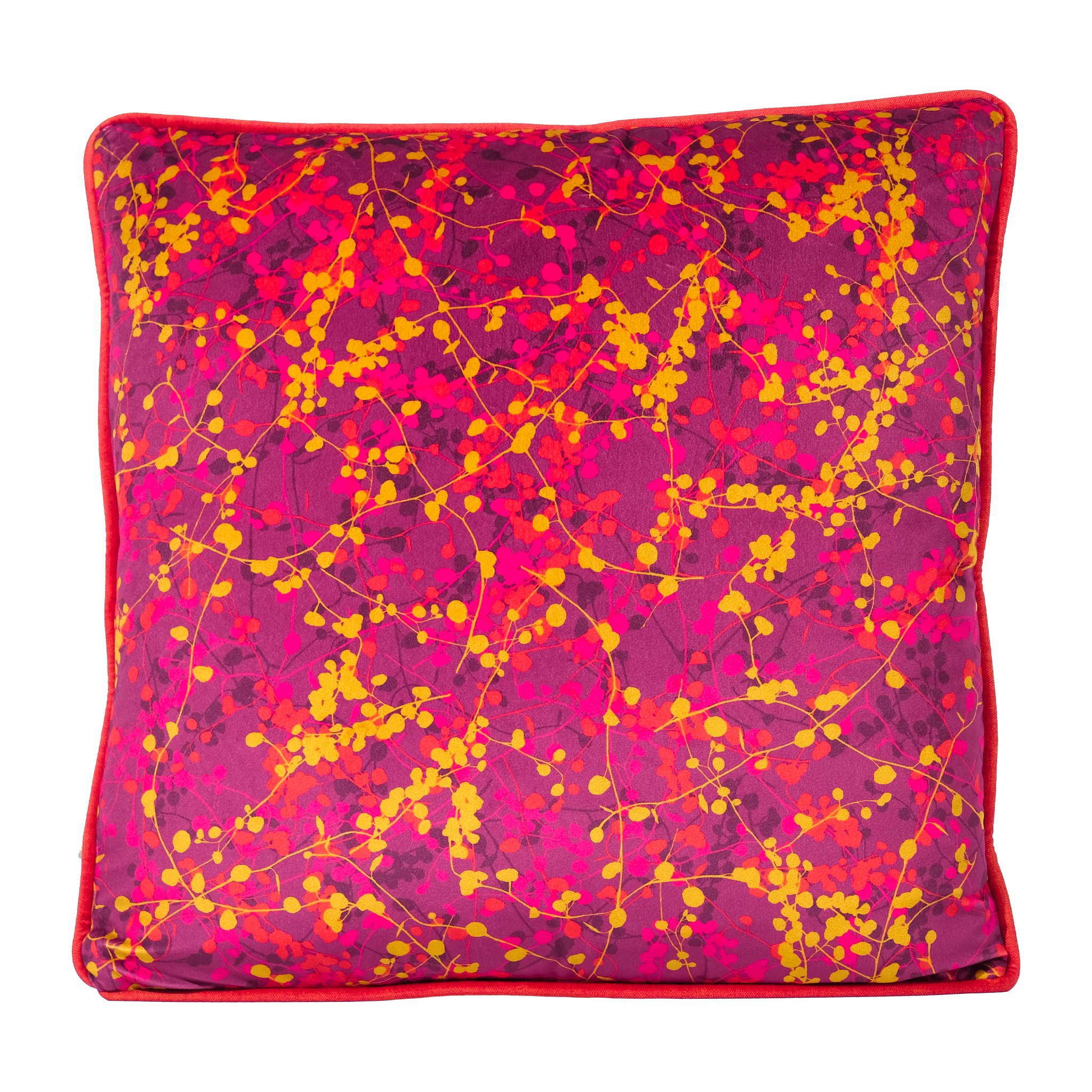 Velvet cushion with a bright leafy pattern in pink and orange