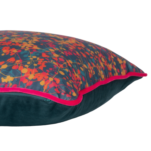 Colourful velvet cushion with fine vine leaves all over in bright colours