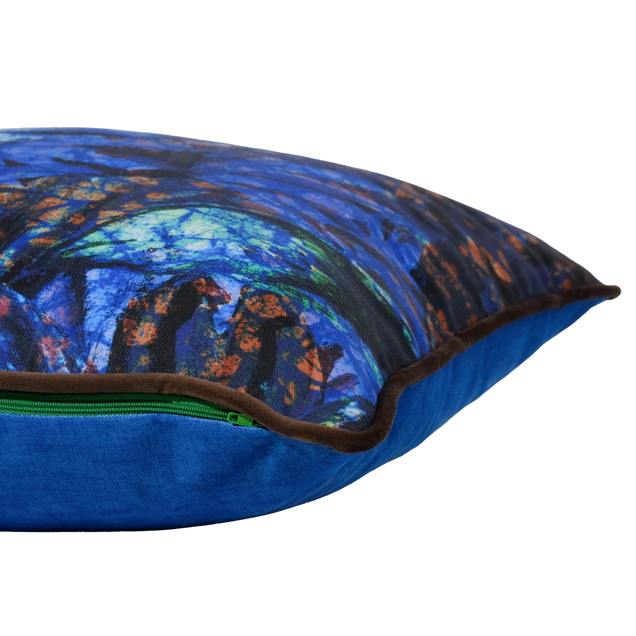 Blue pillow with a colourful blue and green batik design
