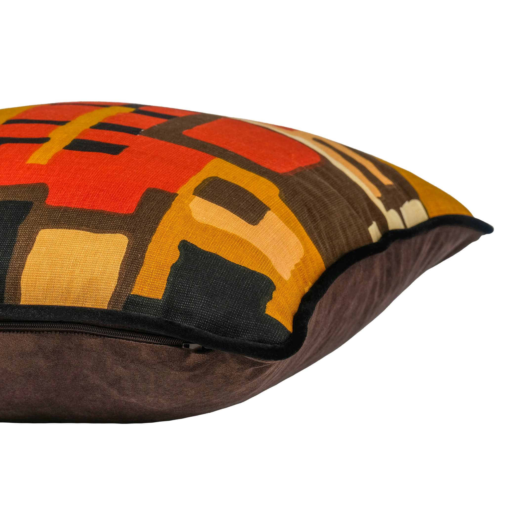 Side photo of a cushion with a mid century modern abstract geometric pattern in red , black, brown and gold