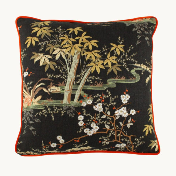 photo of a cushion made from a vintage linen with bamboo and cherry blossoms in a classic 1970s colourway