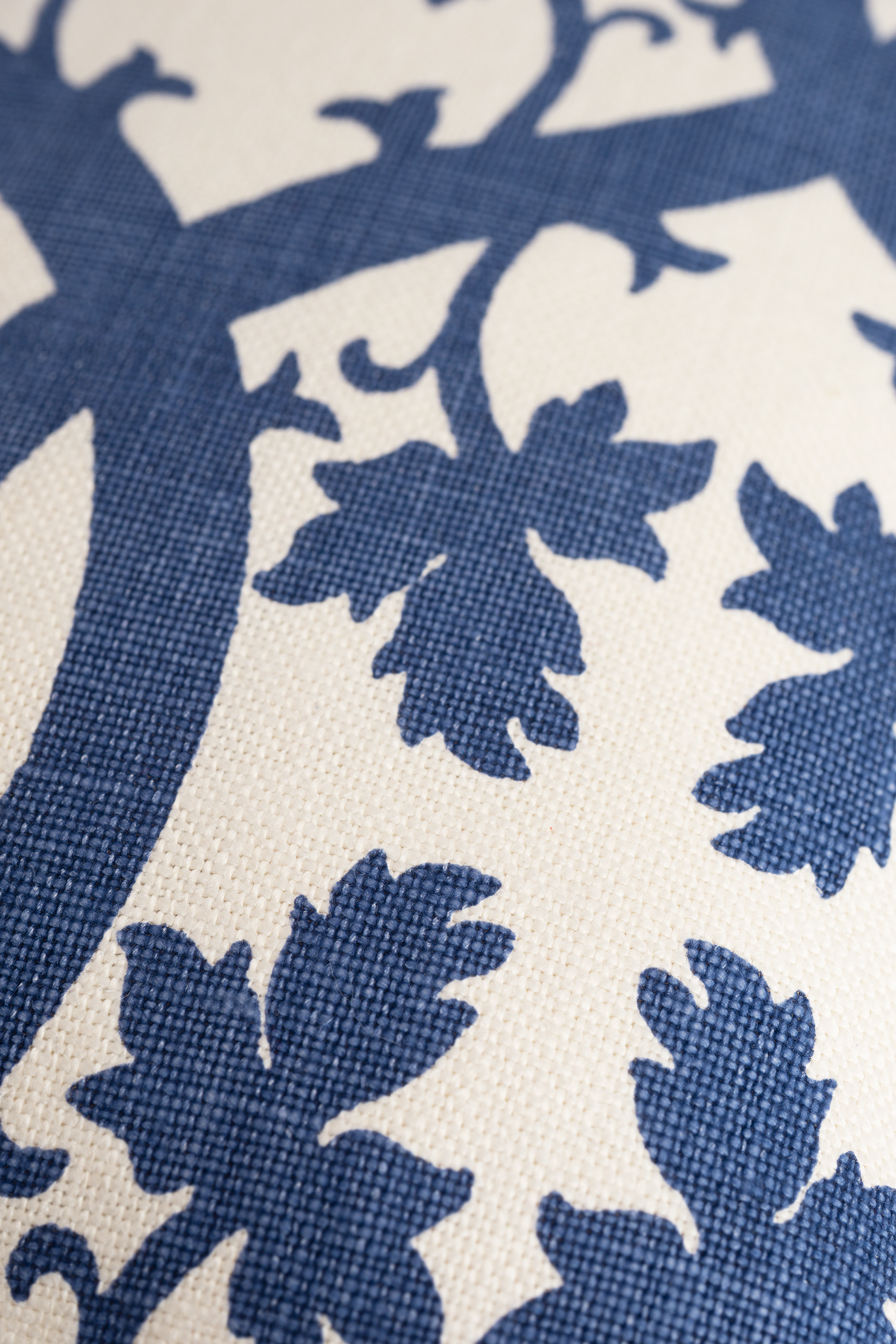 Close-up of blue floral pattern on a white background