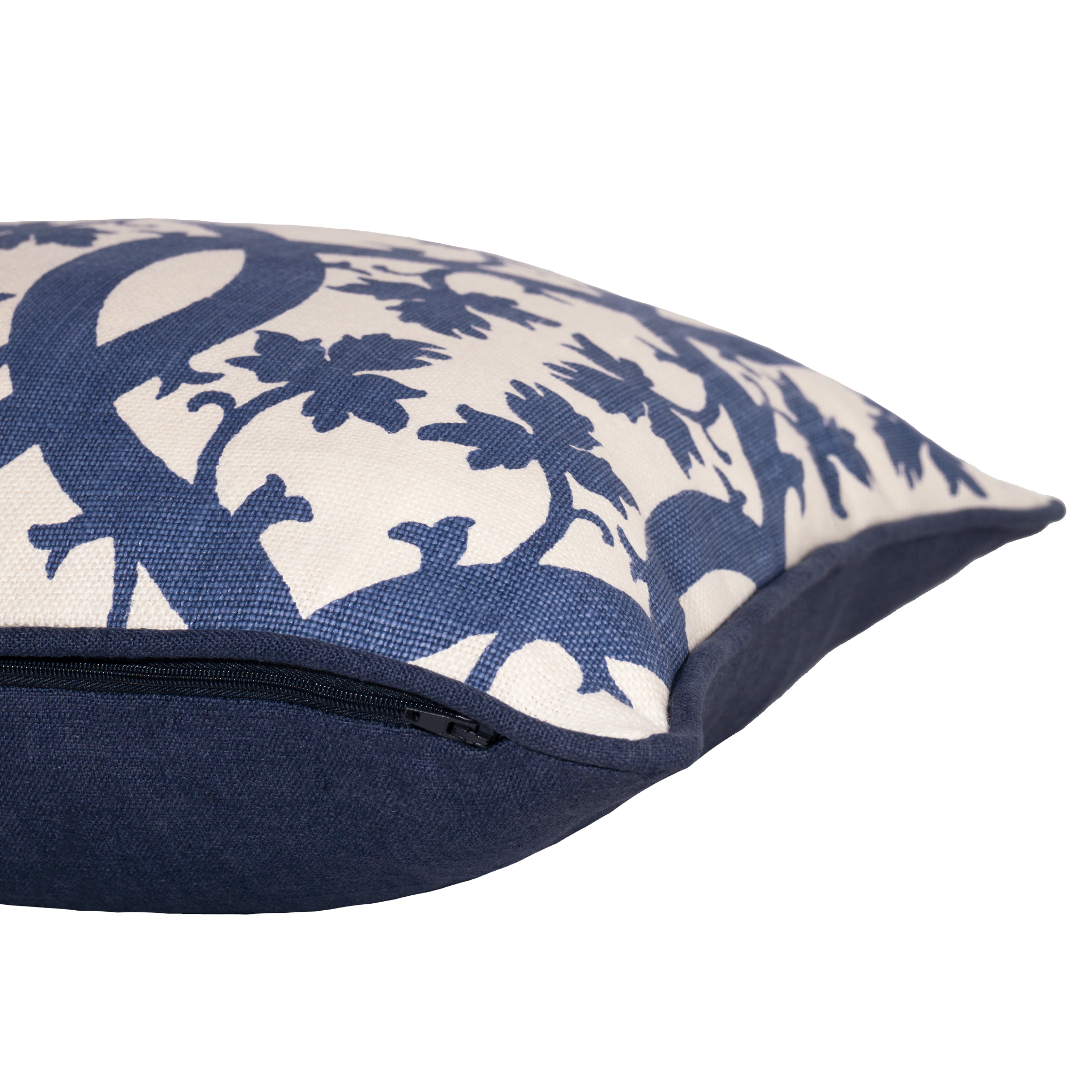 Classic blue and white cushion with a leafy trellis design