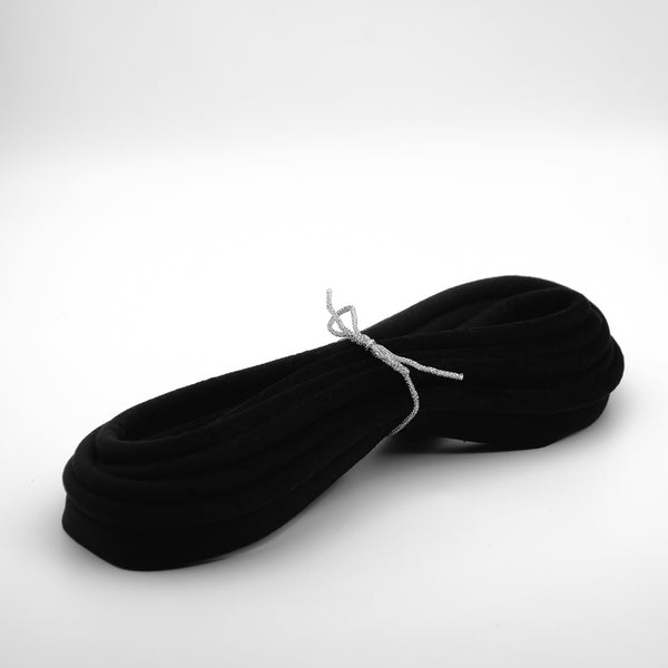 photo of a bundle of black velvet piping cord