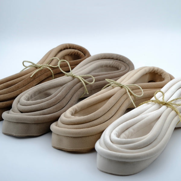 Photos of four bundles of velvet piping cord in warm natural colours