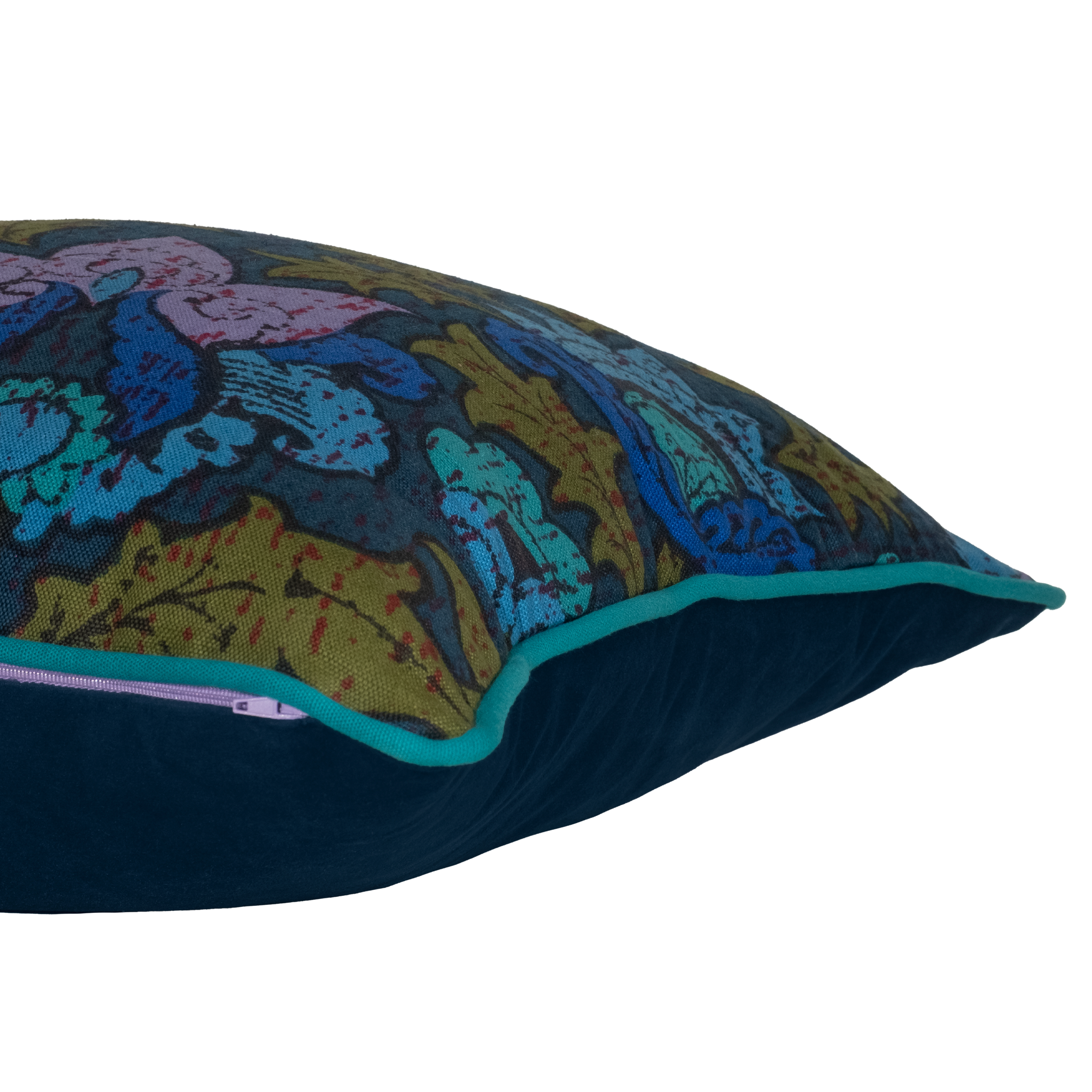 Side shot of a cushion made from a 1970s printed damask in bright blue and purple