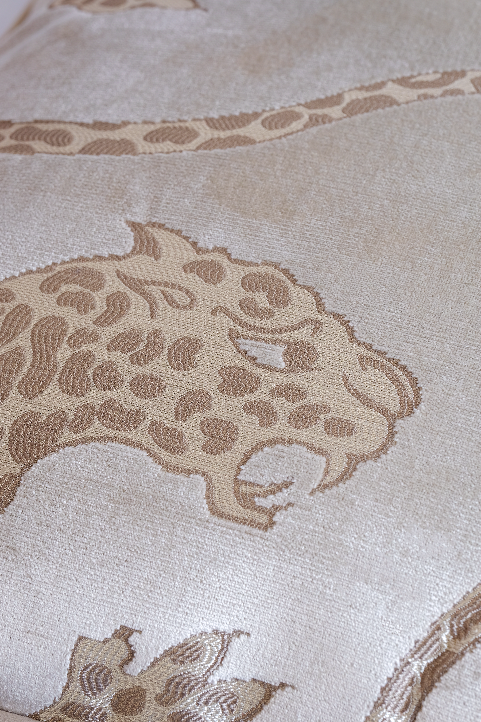 Close up of a ivory velvet with panthers