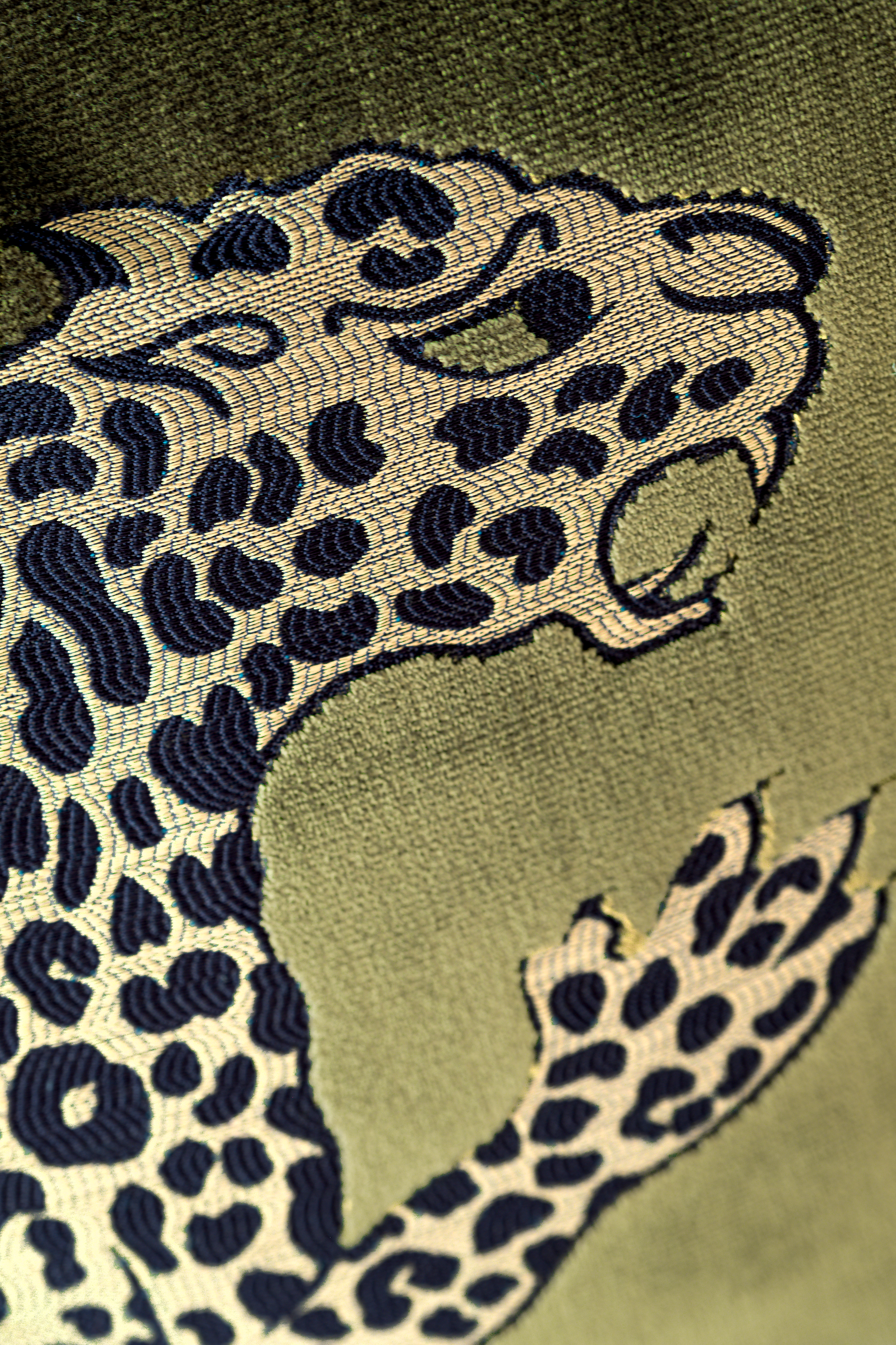 Close up of a lustrous velvet with a panther design