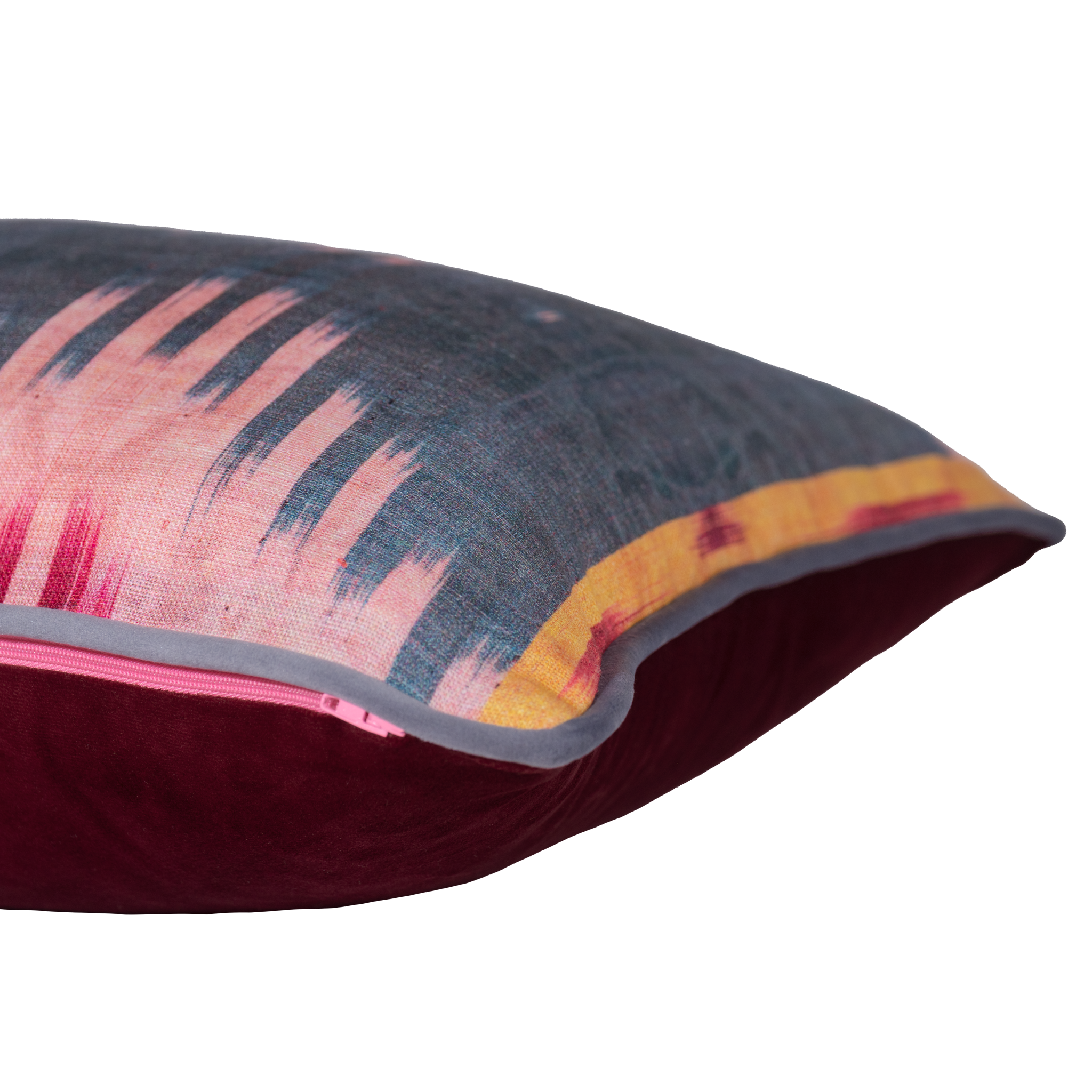 Decorative cushion with a geometric ikat pattern 