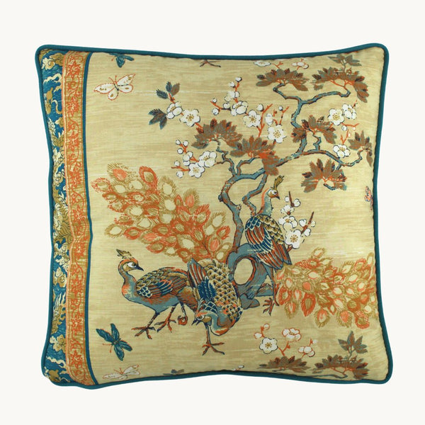 photo of a cushion with peacocks and cherry blossoms with an oriental decorative border