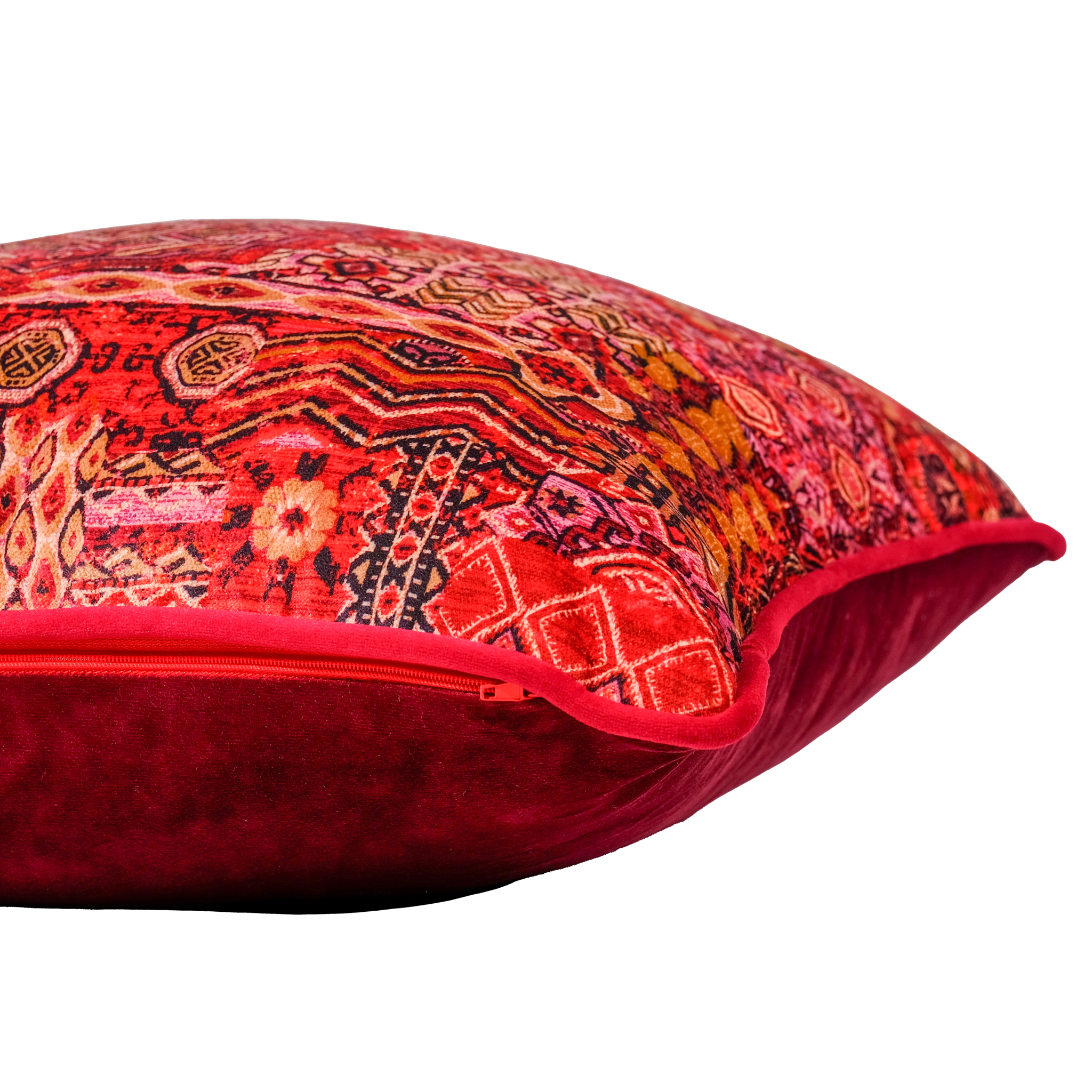 Decorative red pillow with intricate Persian patterns 