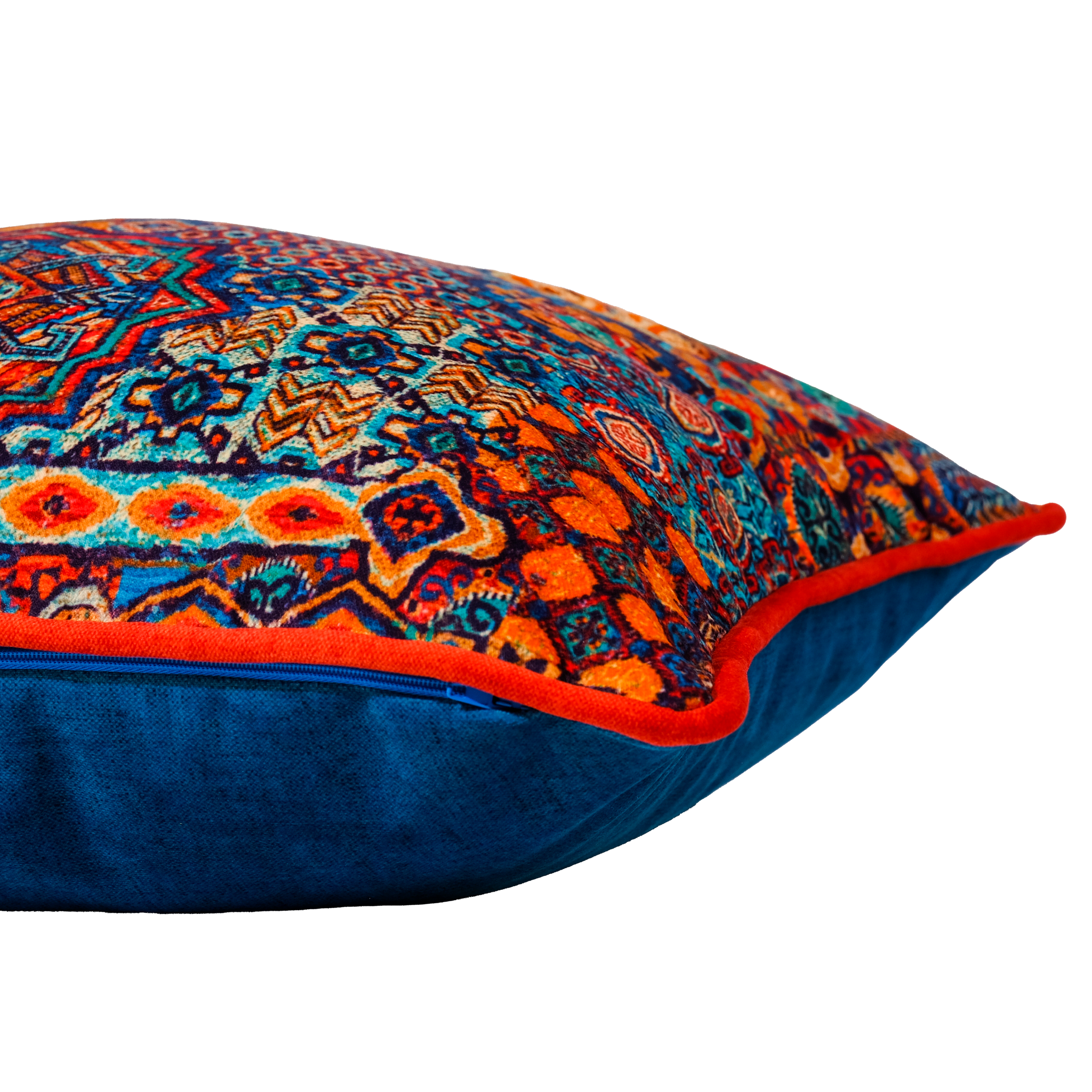 Side shot of a decorative cushion with a colorful Persian geometric pattern in orange, cobalt and turquoise