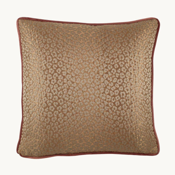 Photo of a rose gold leopard print shiny cushion