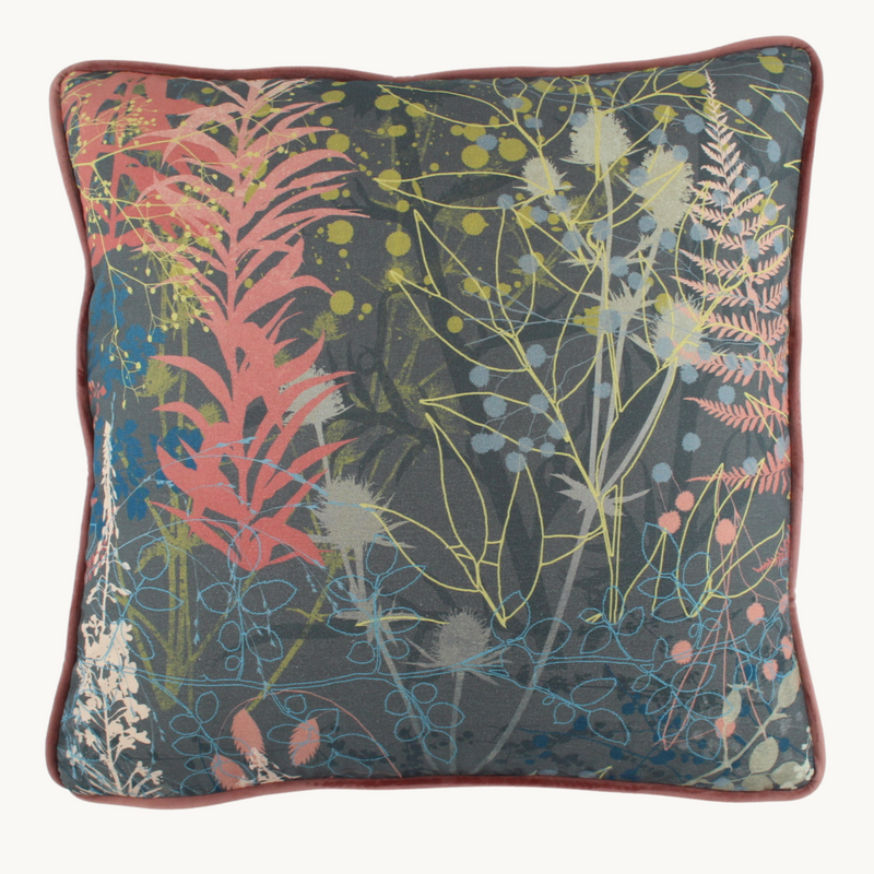 Photo of a botanical cushion in dusty colours