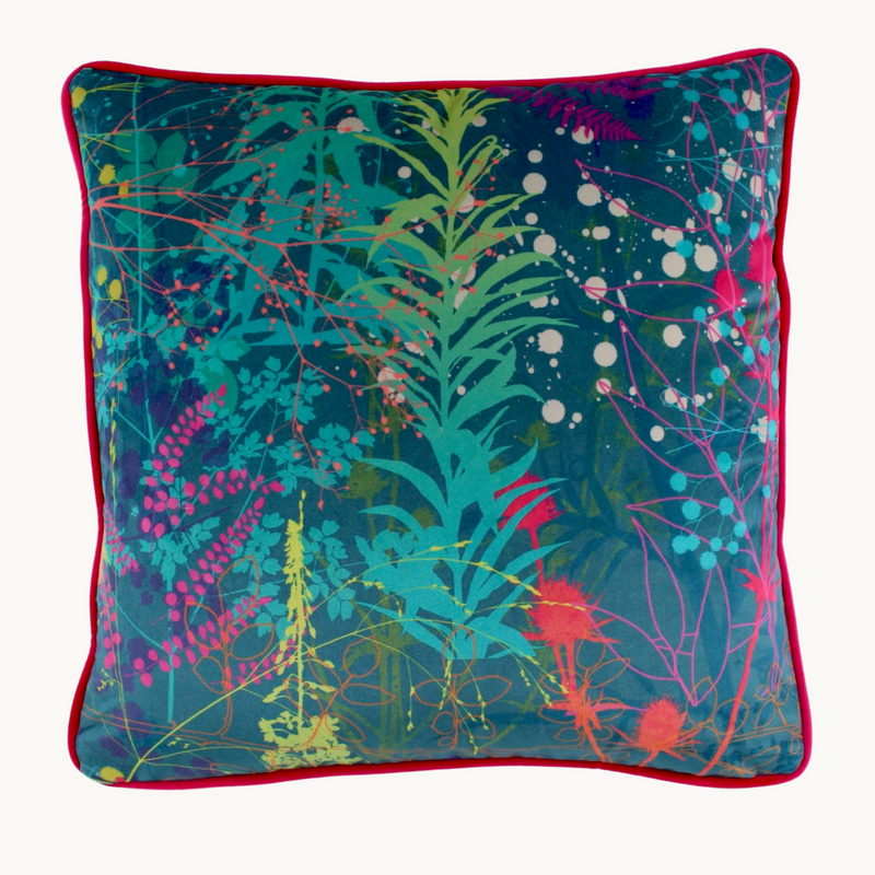 Photo of a vibrant coloured velvet botanical cushion