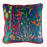 Photo of a vibrant coloured velvet botanical cushion