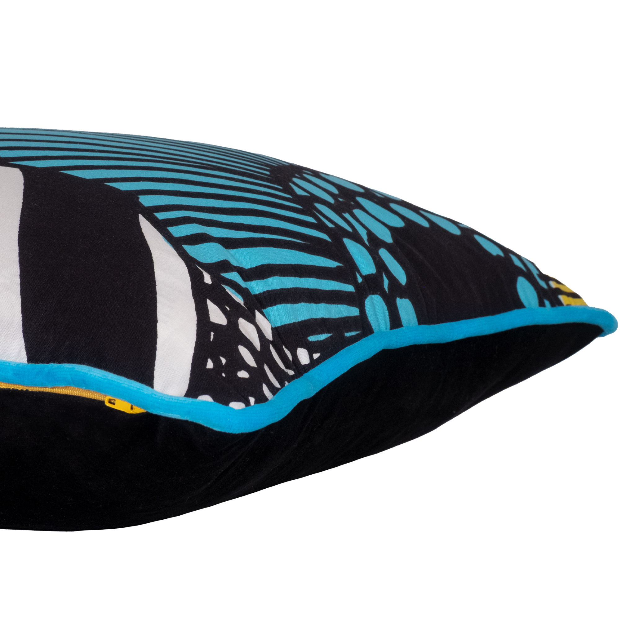 Close-up of a pillow with black, blue, and white pattern on a white background