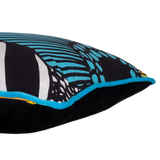 Close-up of a pillow with black, blue, and white pattern on a white background