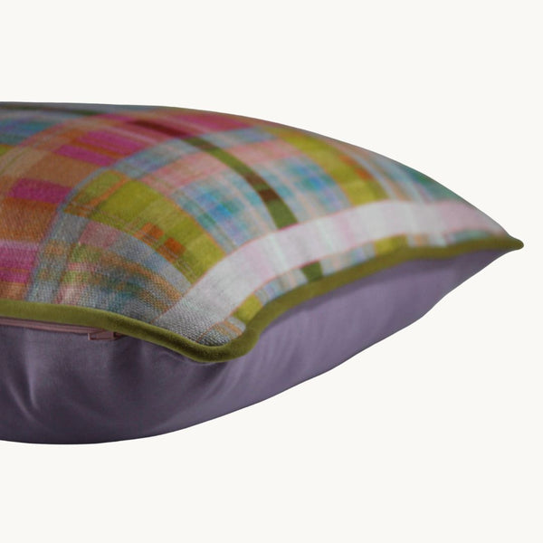 Side photo of a cushion made from a colourful pastel plaid printed onto linen
