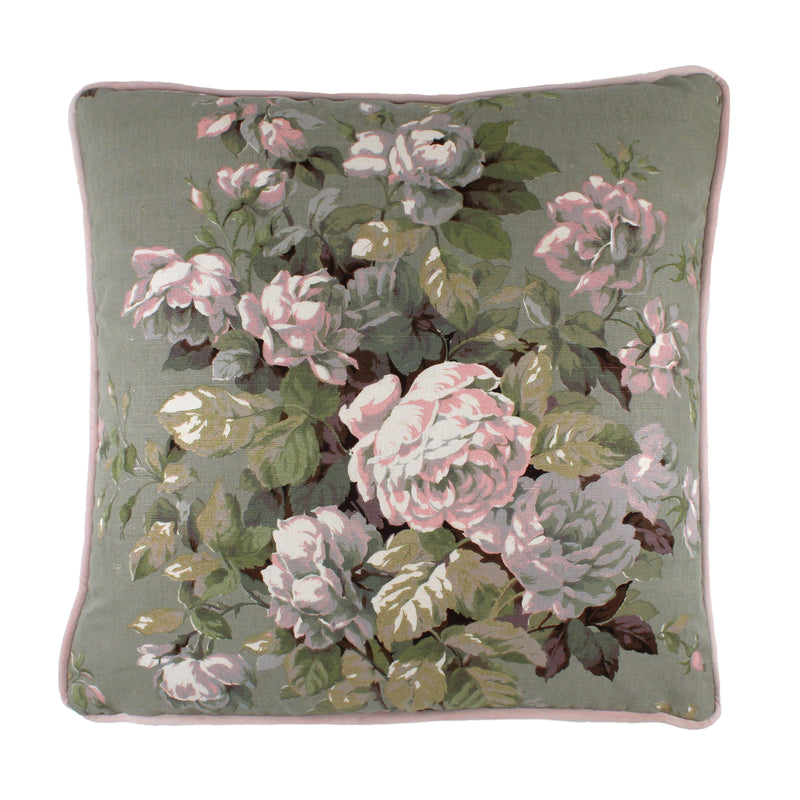 image of floral cushion front with sage background and soft pink flowers and grennery