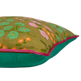Floral cushion in bright pink, orange, green and chartreuse