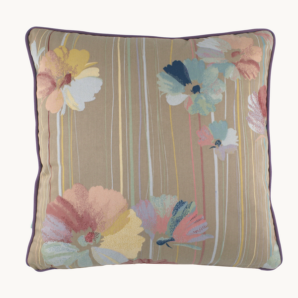 Photo of a square cushion with a biscuit coloured base and large painterly pastel flowers with lines in the same colours through the background