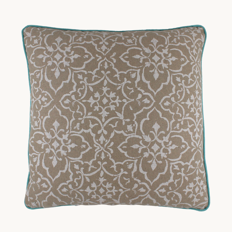 Photo of printed linen back of an aqua silk blend botanical cushion 