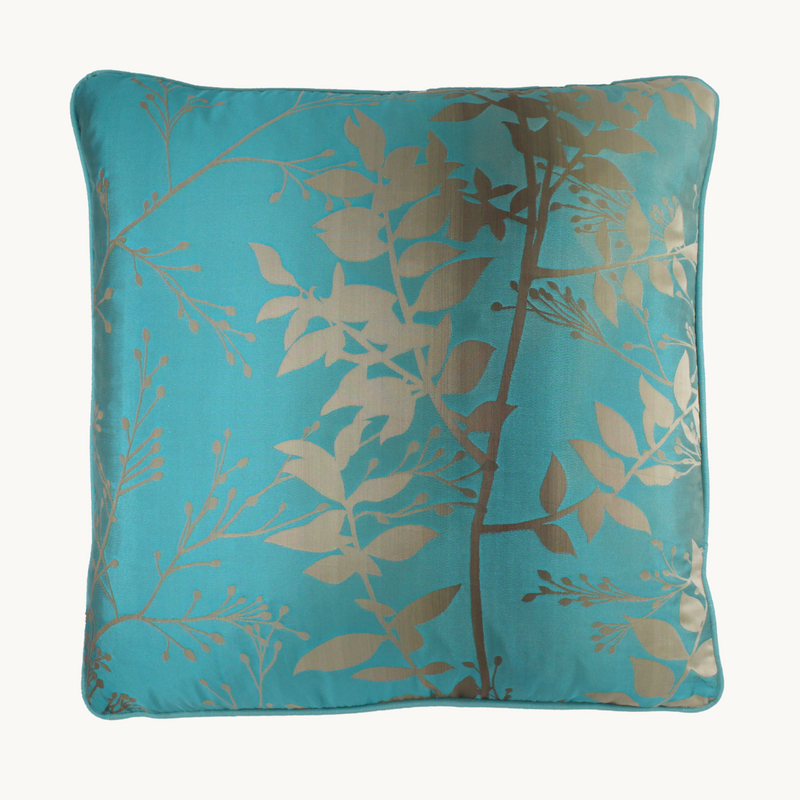 Silk blend aqua cushion with taupe coloured botanical silhouettes