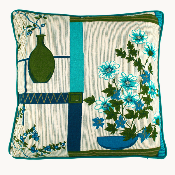 Cushion with a mid century feel, Ikebana floral arrangements in turquoise, olive and aqua.