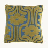 Photo of a cushion in a large scale retro floral design in chartreuse and cobalt