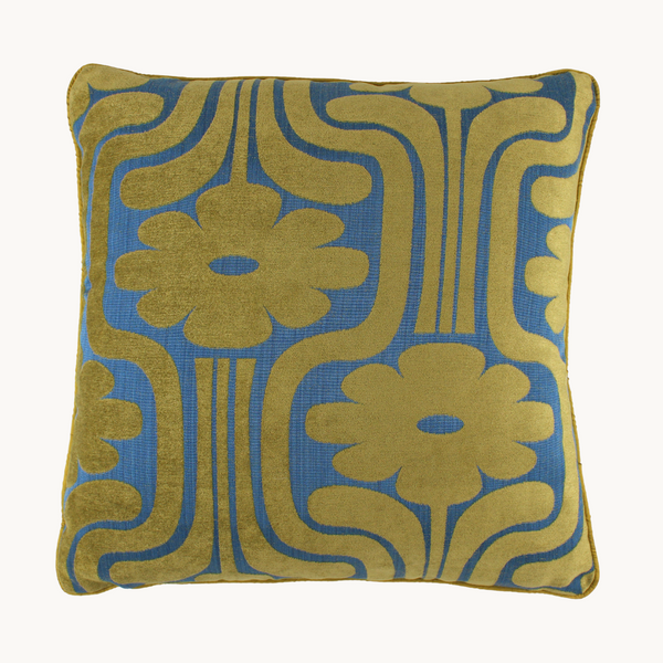 Photo of a cushion in a large scale retro floral design in chartreuse and cobalt